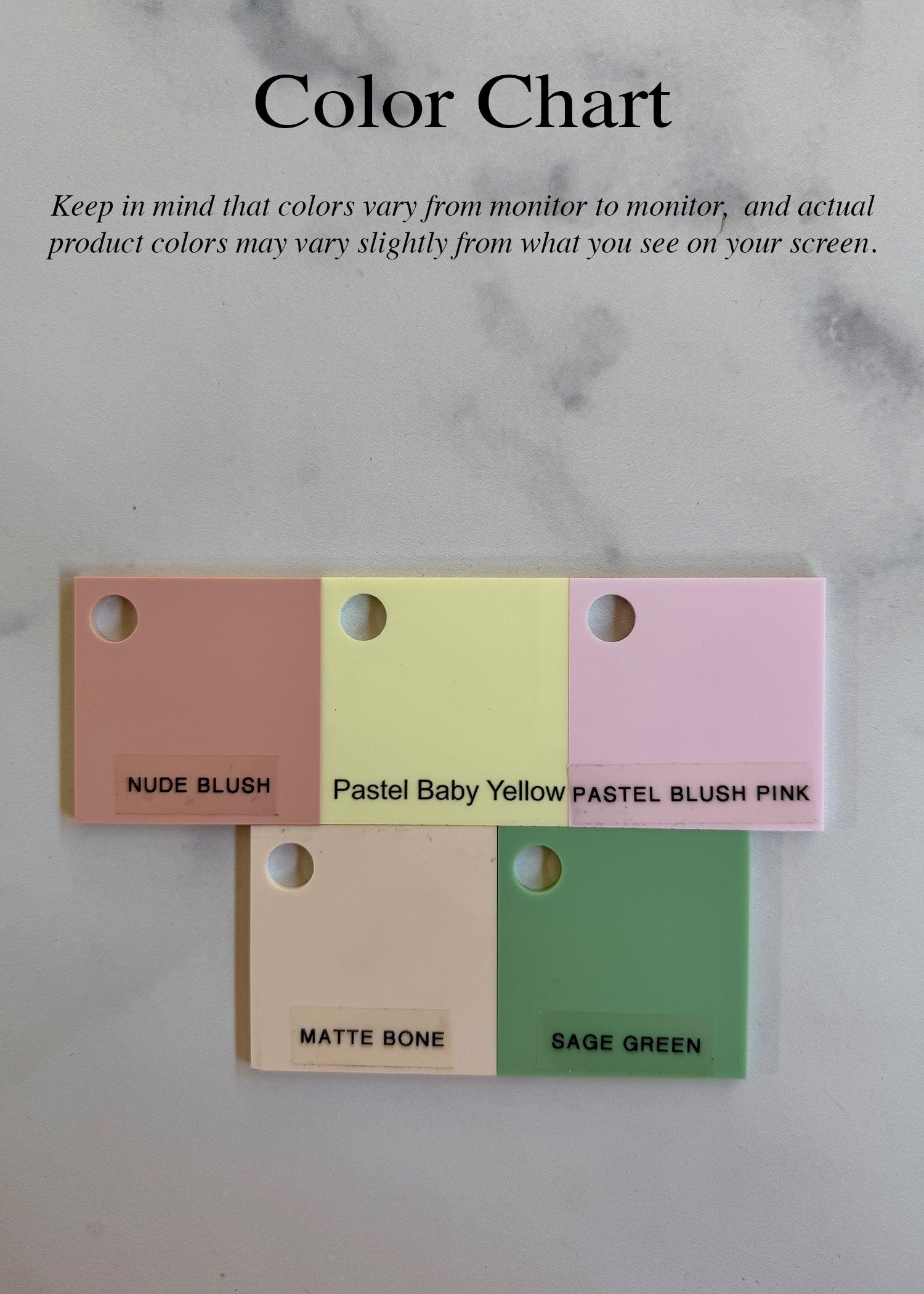 Color swatch chart with labels on a marble background