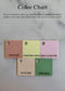 Color swatch chart with labels on a marble background