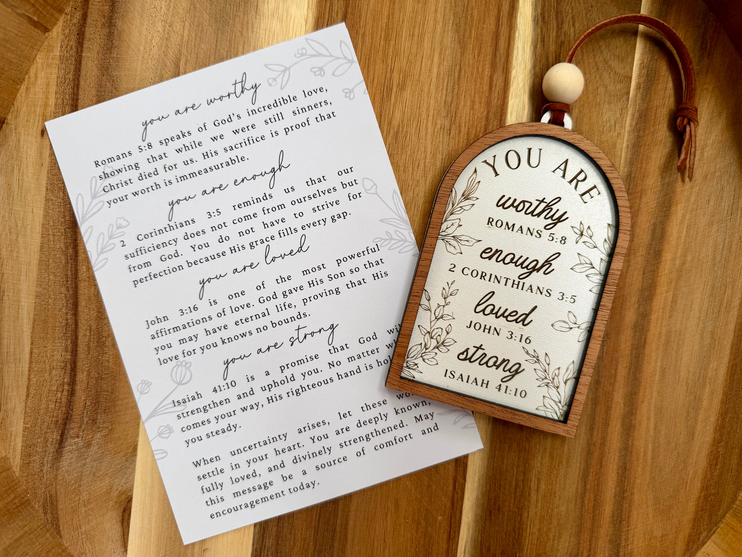 Wooden sign with motivational scriptures and matching card on a wooden surface