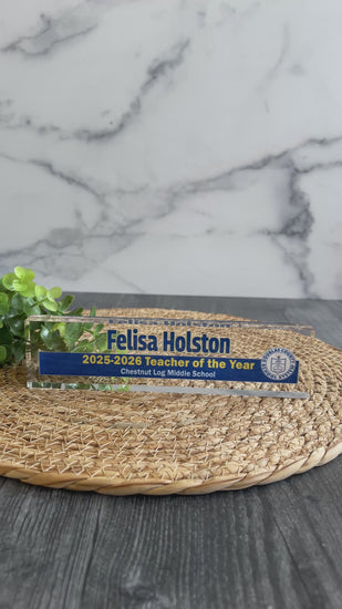 A DCSS nameplate for Felisa Holston showing the dimension of the nameplate