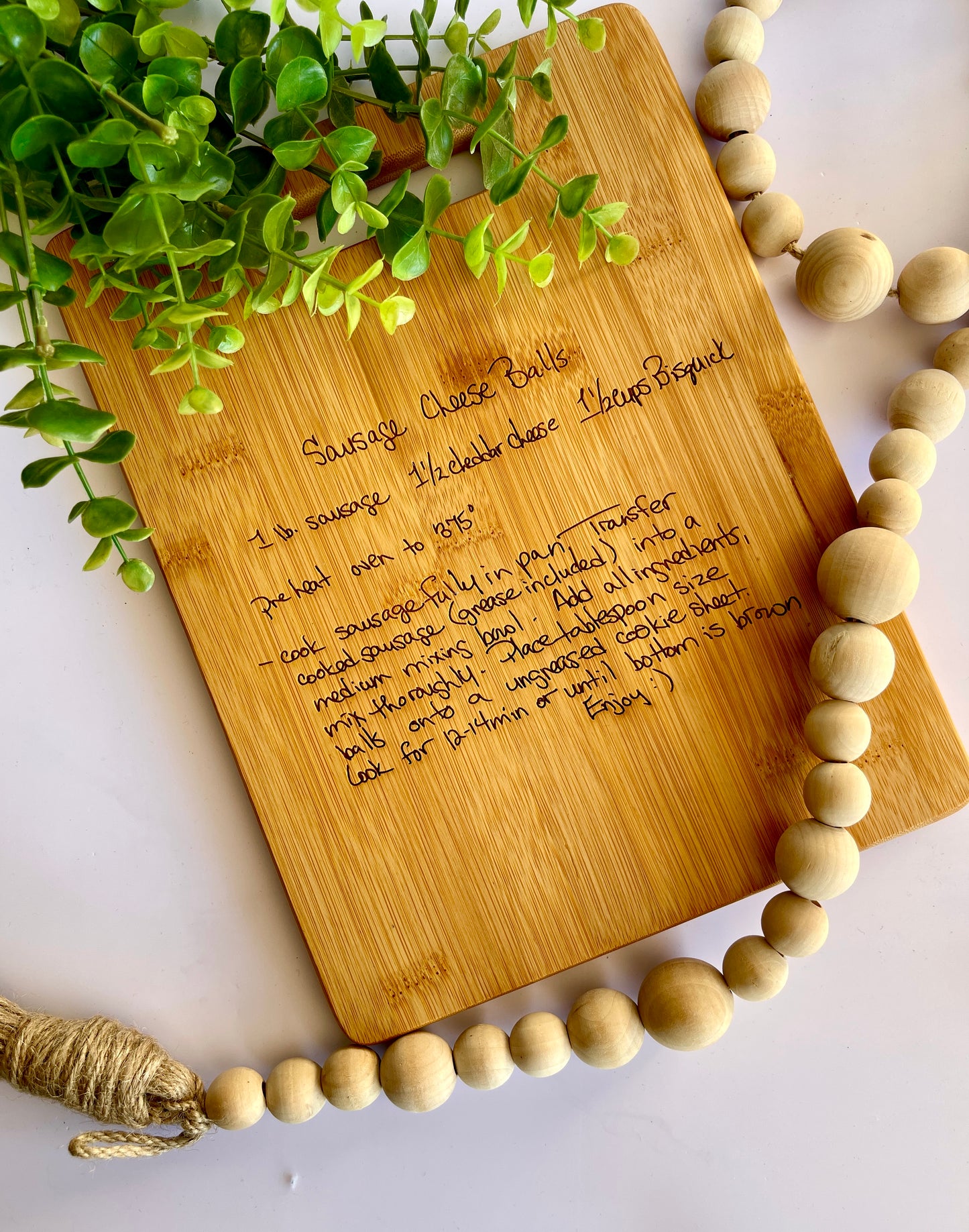 A custom engraved recipe cutting board