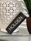 A personalized engraved 20 oz. stainless steel groom tumbler with a clear push-on lid, displayed in front of a white geometric.