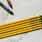 A set of engrave Ticonderoga engraved pencils.